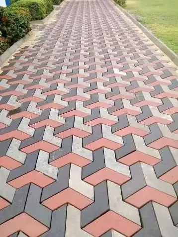 Paved pathway with a 3D geometric cube pattern
