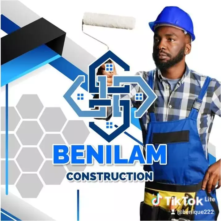 Construction worker holding a paint roller with company branding
