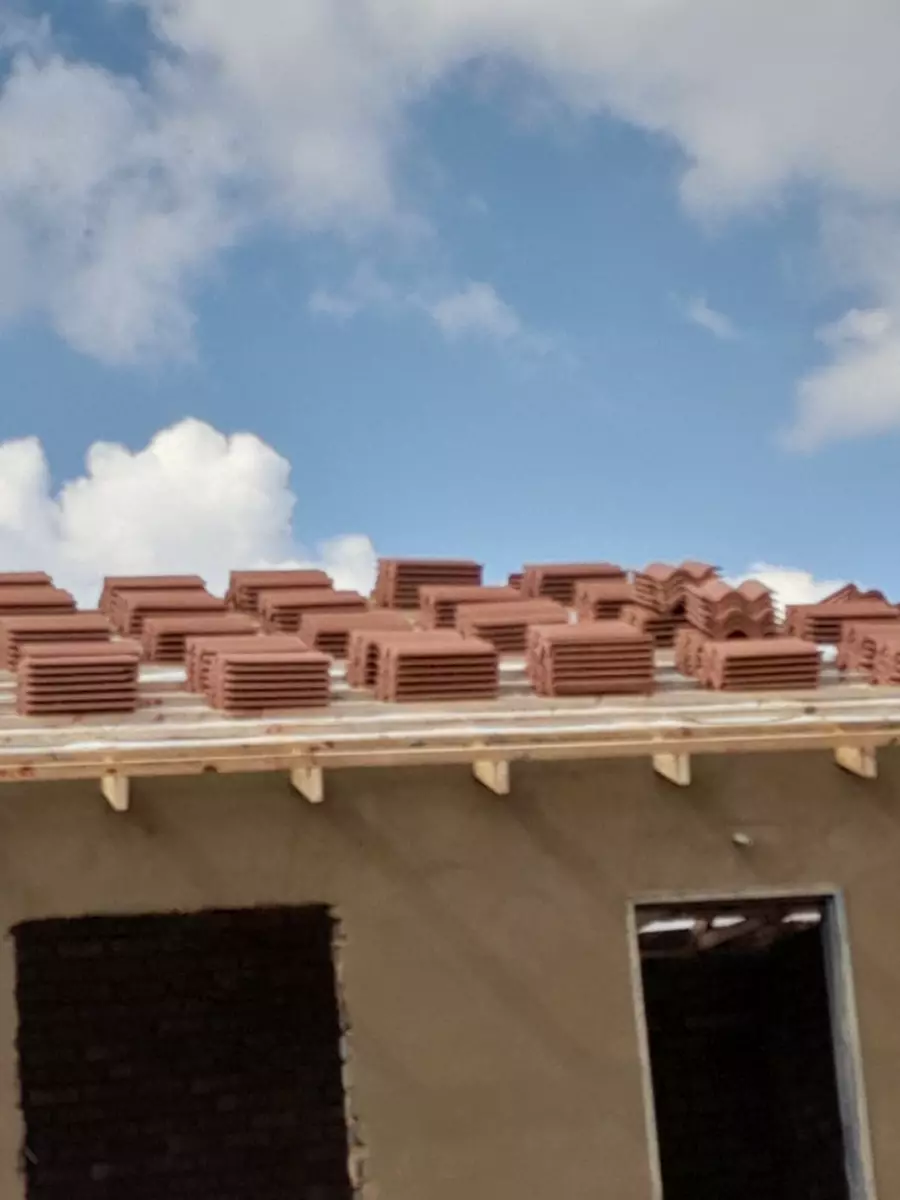 Roof tiles stacked on a house under construction