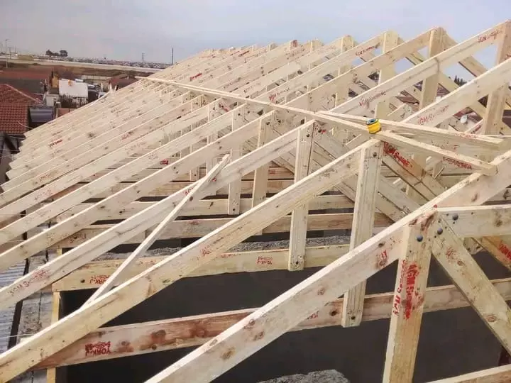 Wooden roof framing on a construction project