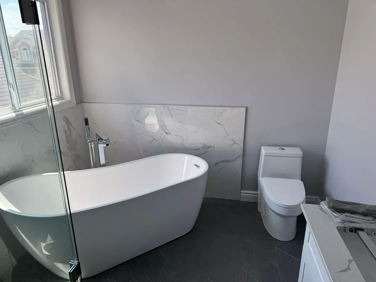 Modern bathroom interior with freestanding bathtub